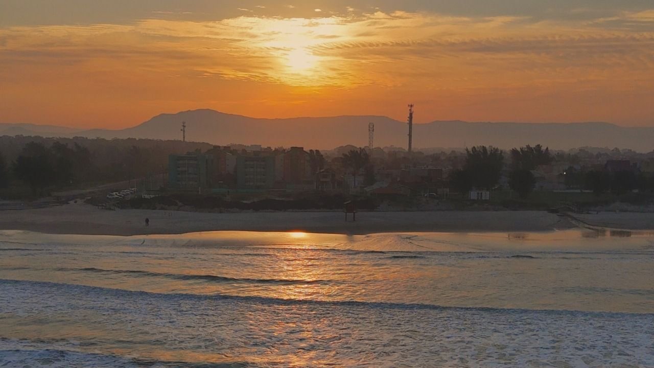 Capão Novo: Por que imóveis perto da praia valem mais! — Imoveis Capao Novo Praia Investir
